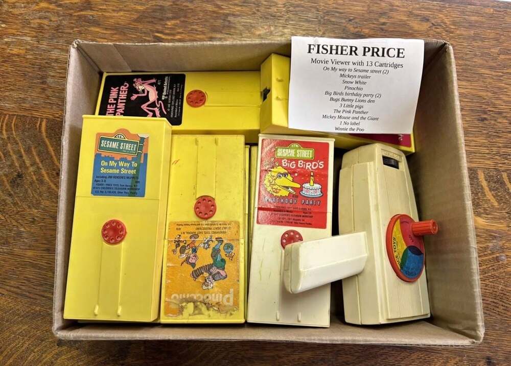 Vintage Fisher-Price Movie Viewer with 13 Assorted Movie Cartridges